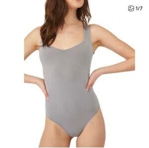 Free People bodysuit nice gray color double lined at bra area. Versati  XS'-S